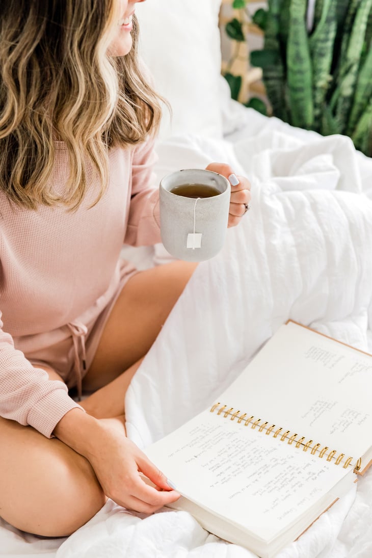 Woman Drinking Tea In Bed